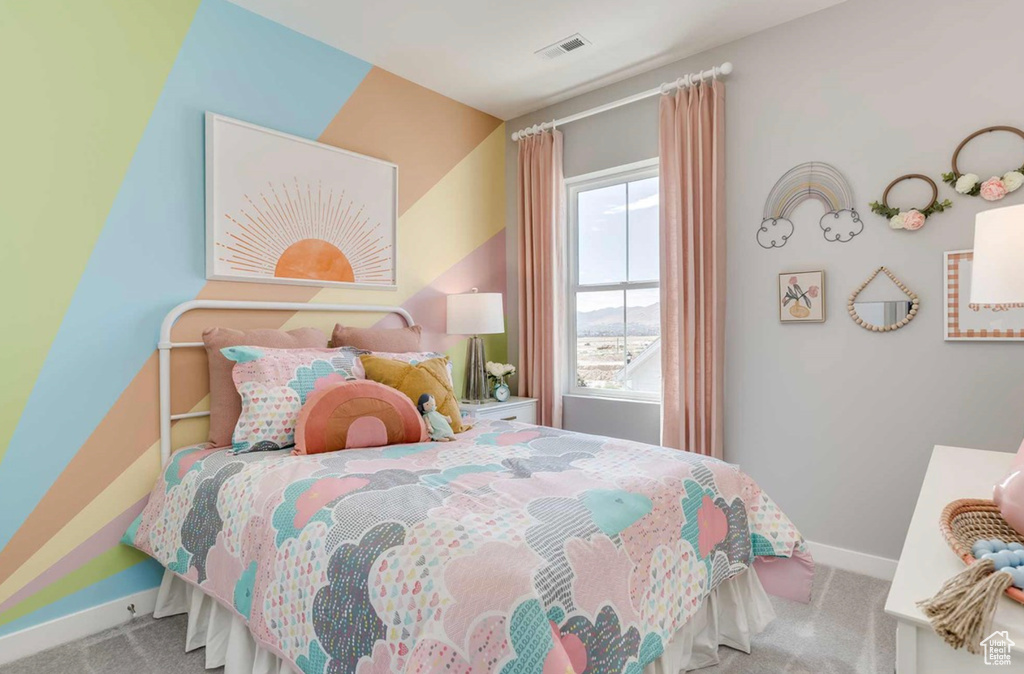 Bedroom with carpet and baseboards