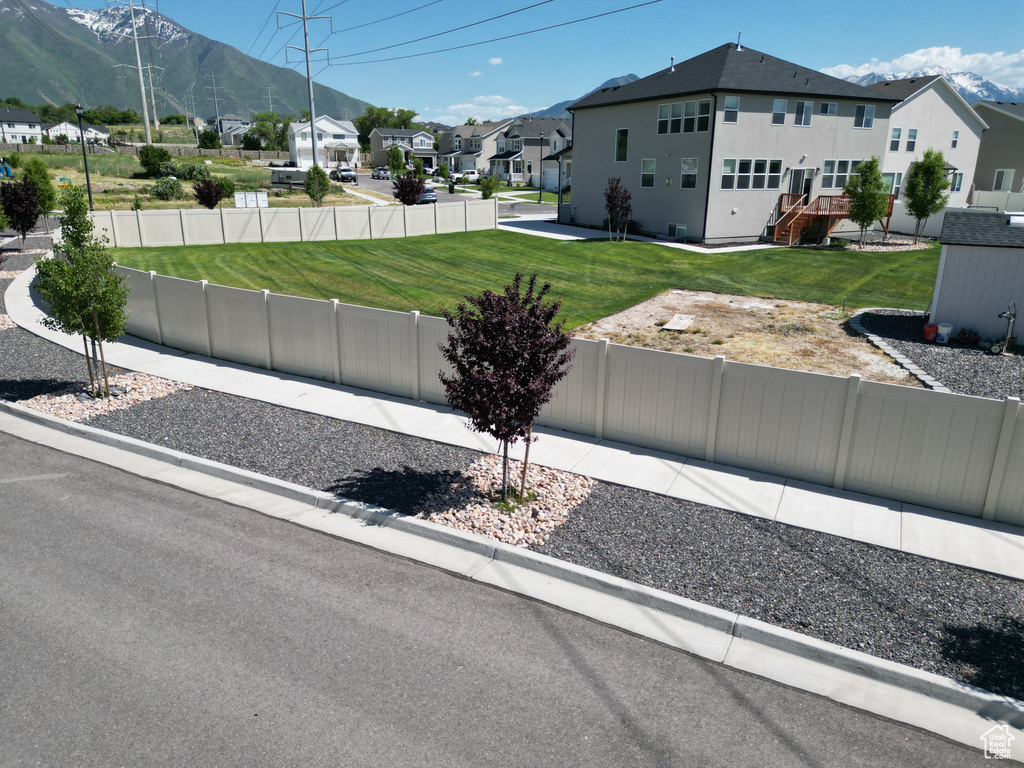 Exterior space with a mountain view and a residential view