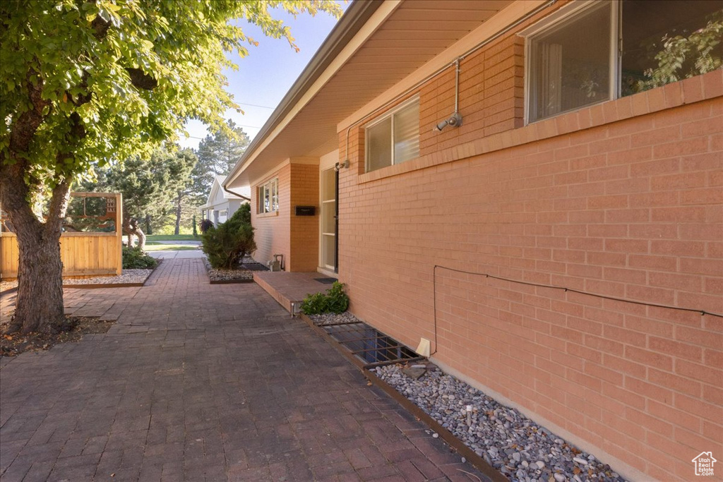 View of home\'s exterior featuring brick siding