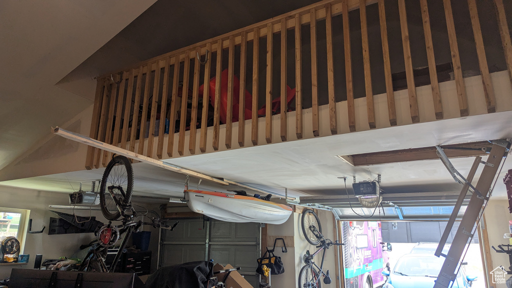 Garage featuring a garage door opener
