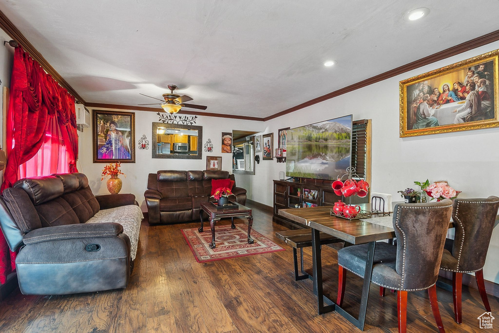 Living area featuring ornamental molding, a ceiling fan, wood finished floors, recessed lighting, and baseboards