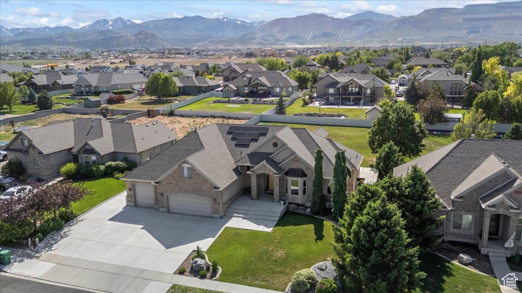 Aerial view of residential area with mountains