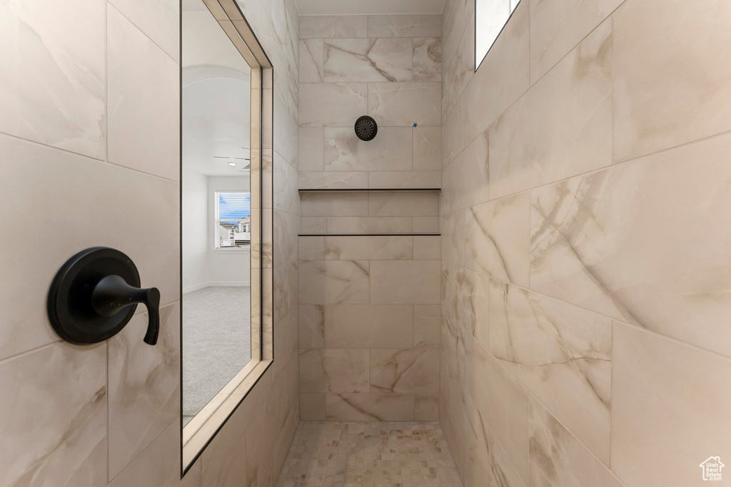 Bathroom with a tile shower