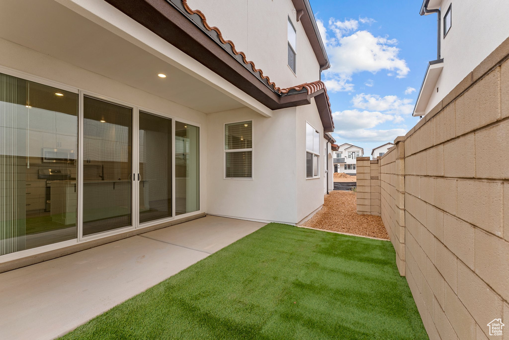 View of yard with a patio area
