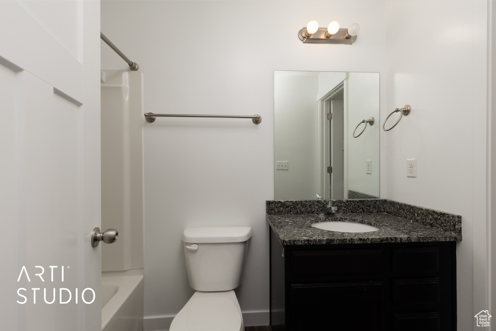 Full bath with vanity and toilet