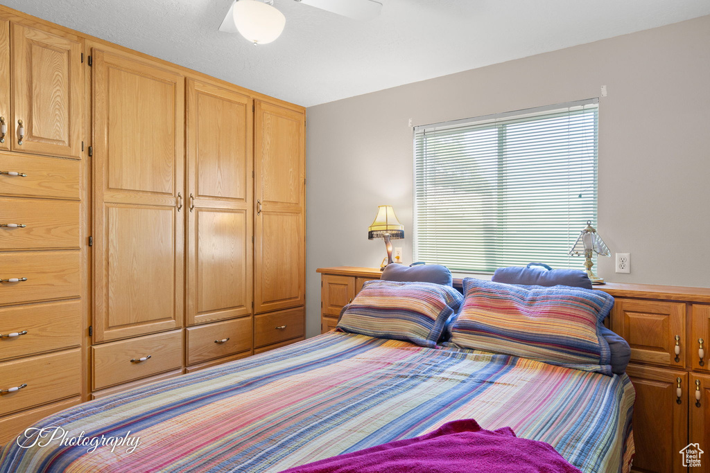 Bedroom with a ceiling fan