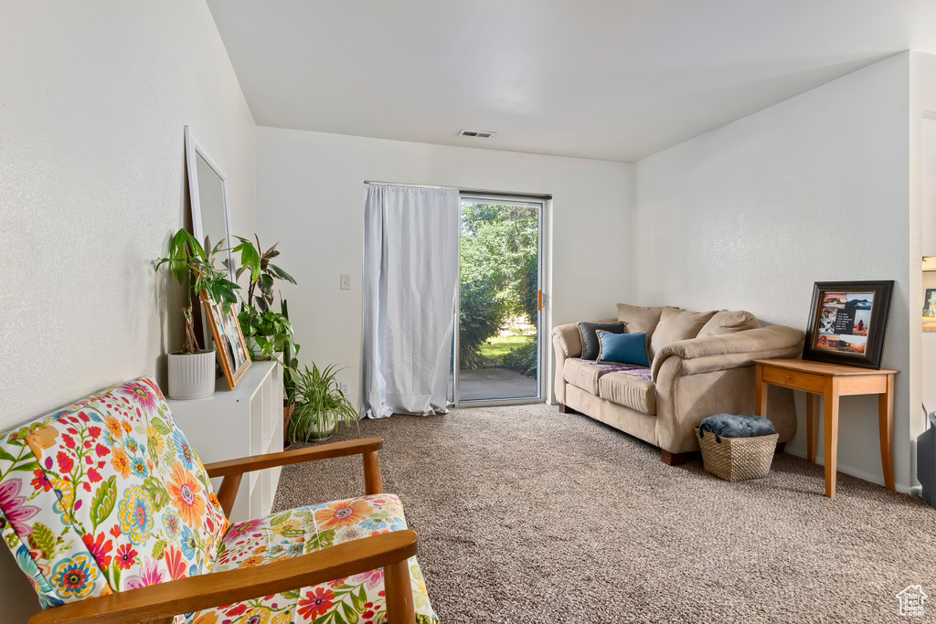 Living area featuring carpet floors