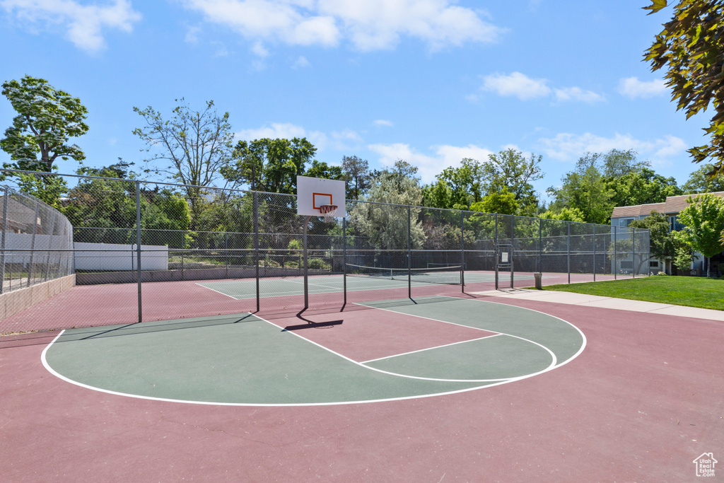 View of sport court featuring community basketball court and a tennis court