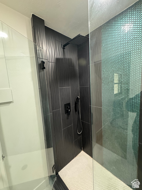 Full bathroom featuring a stall shower