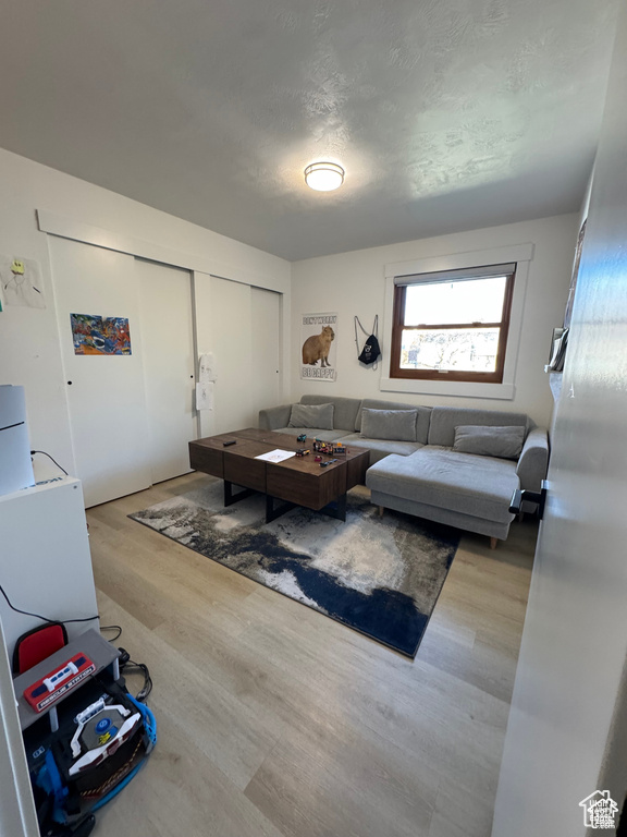 Living area featuring wood finished floors
