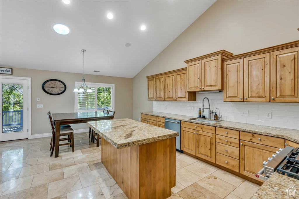 Kitchen with dishwasher, a sink, a center island, backsplash, and lofted ceiling