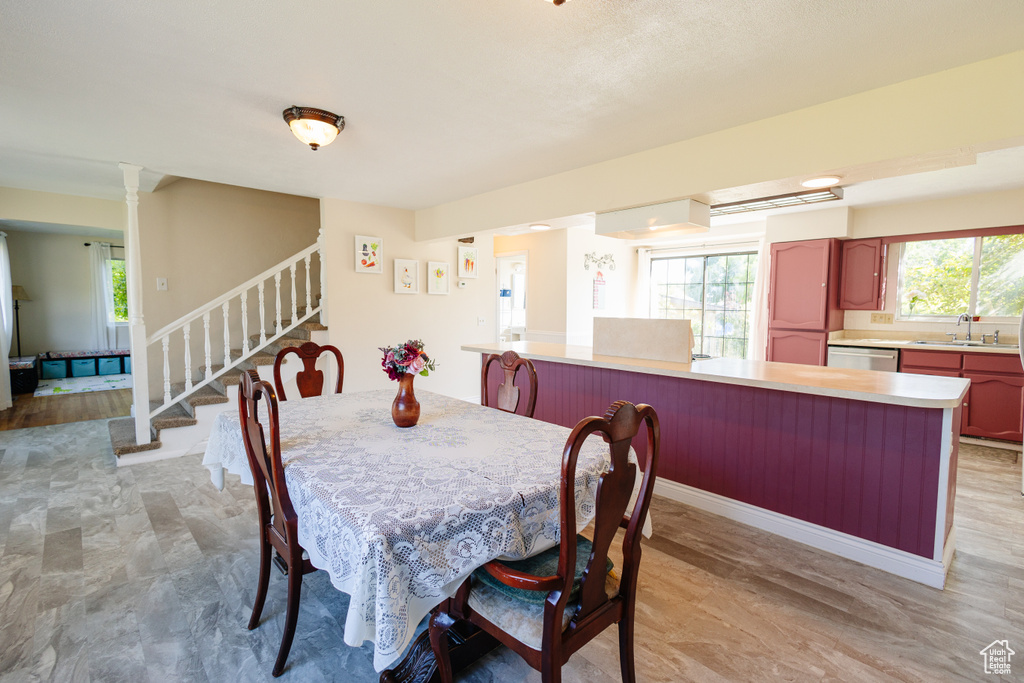 Dining space featuring stairway