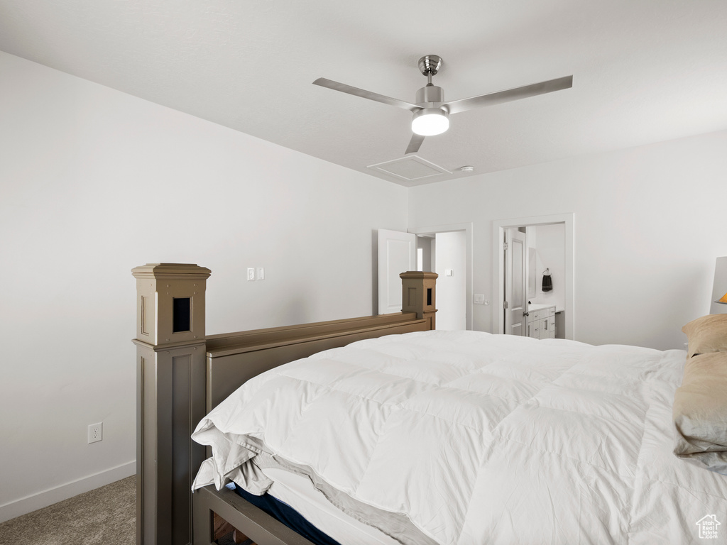 Bedroom with carpet floors, a ceiling fan, and baseboards