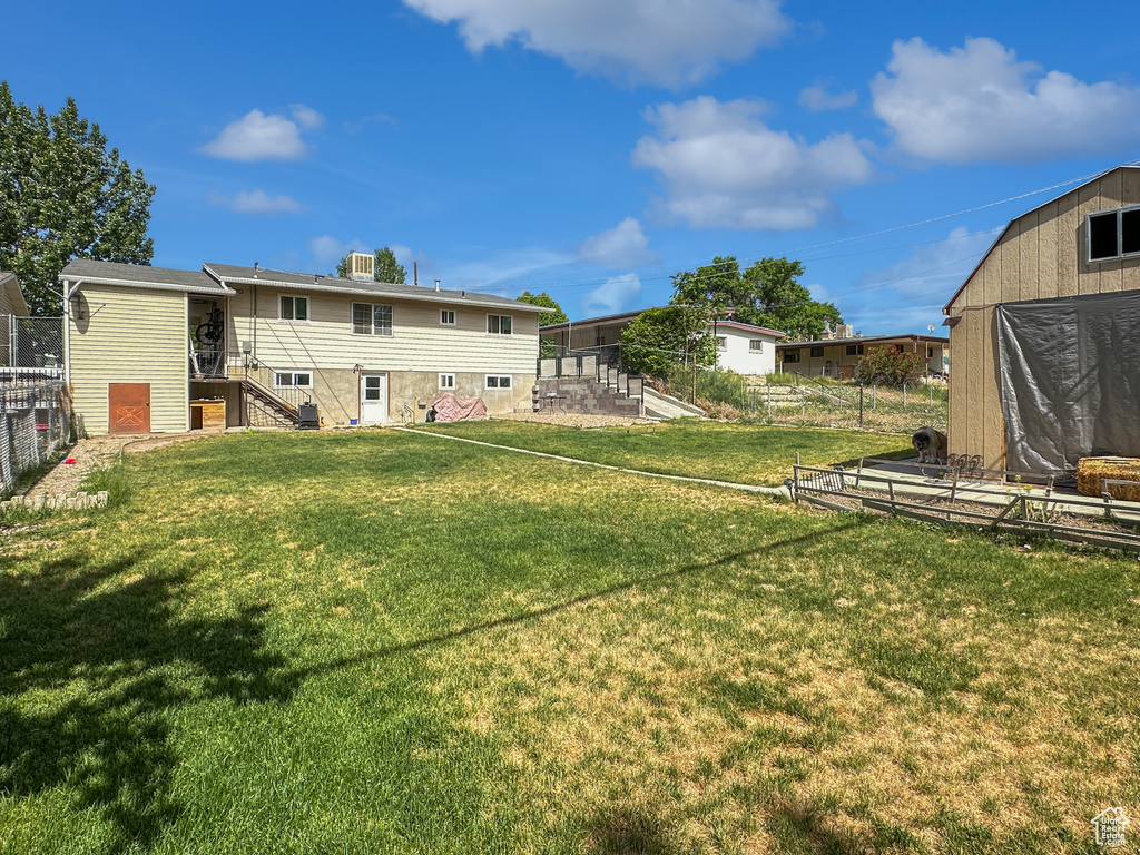 View of yard with stairway