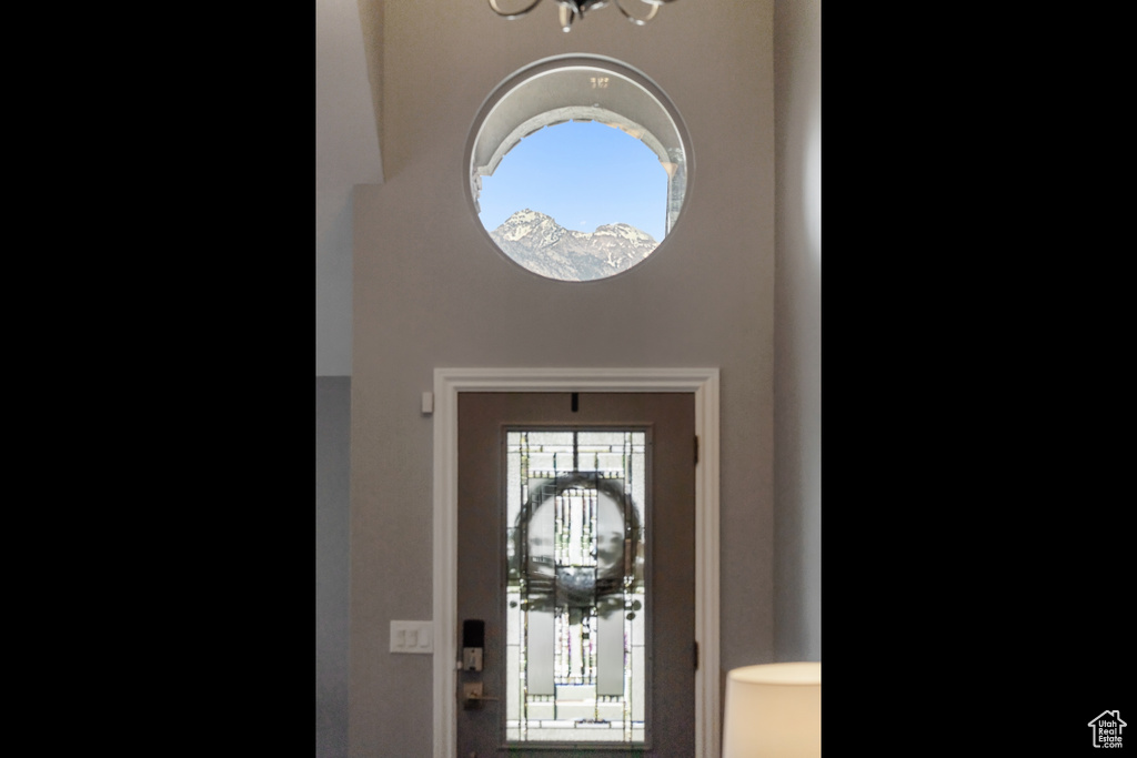 Foyer featuring a chandelier
