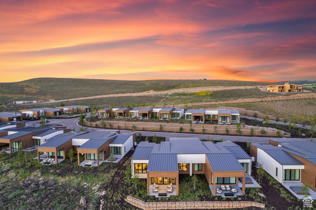 Aerial view at dusk of a mountain view and a residential view