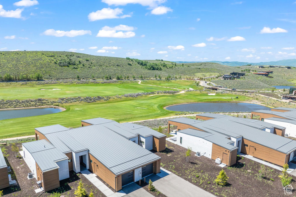 Bird's eye view of a water and mountain view and a local golf course