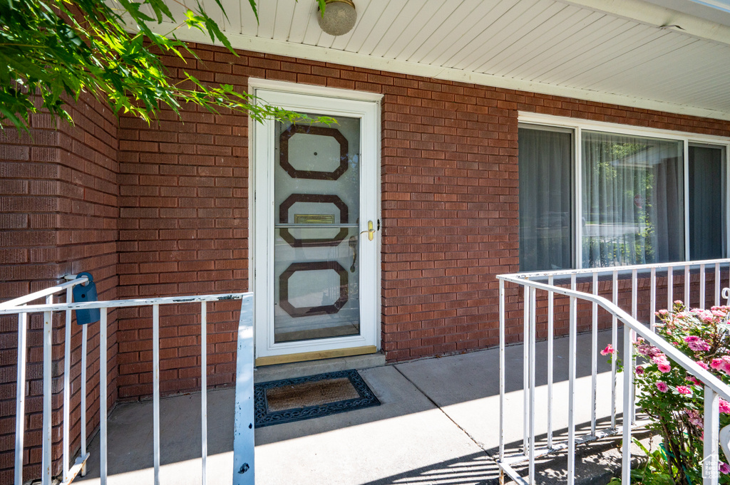 Property entrance with brick siding