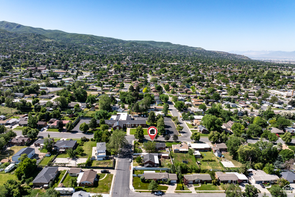 Aerial view of residential area featuring mountains