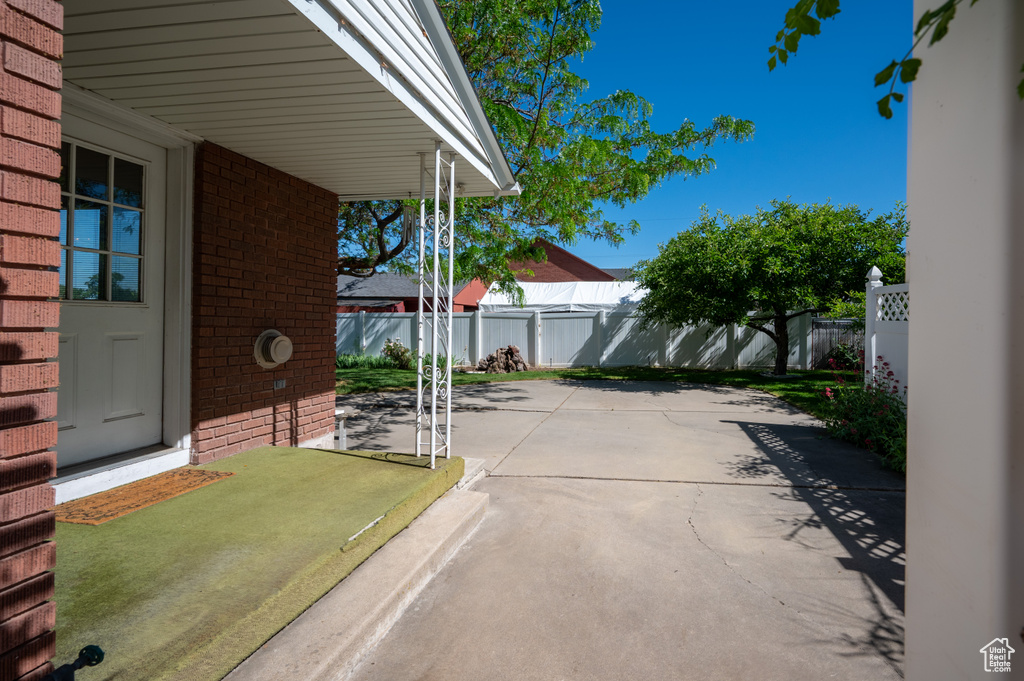 Fenced backyard featuring a patio area