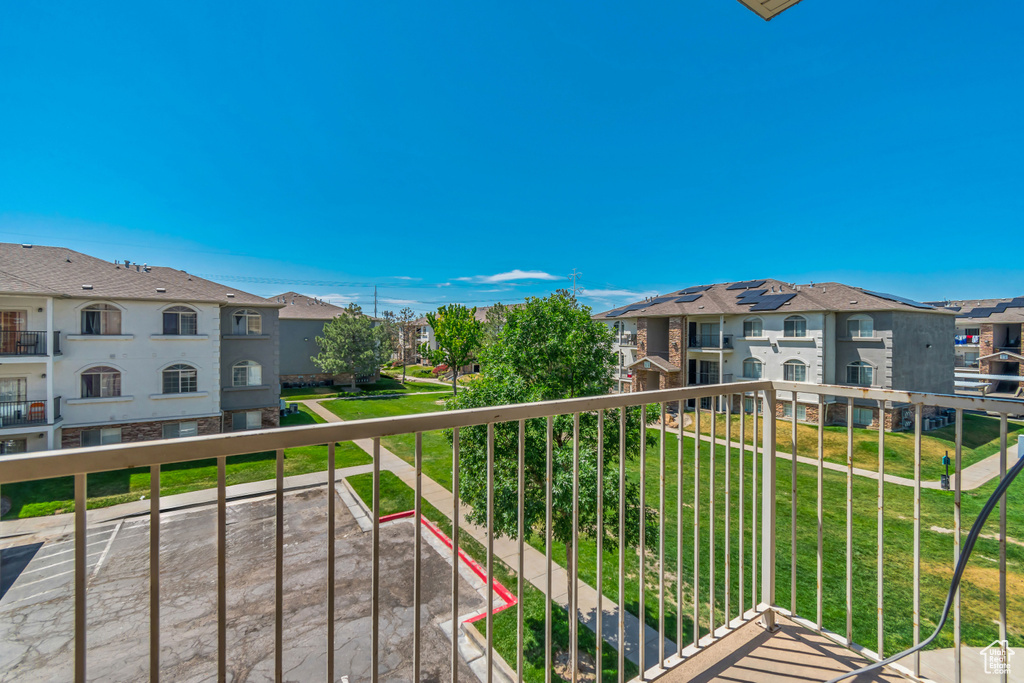 Balcony featuring a residential view