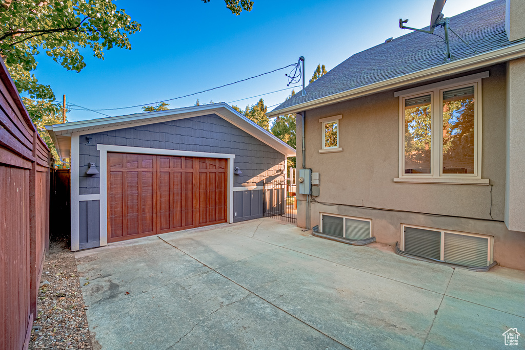 Detached garage with a gate