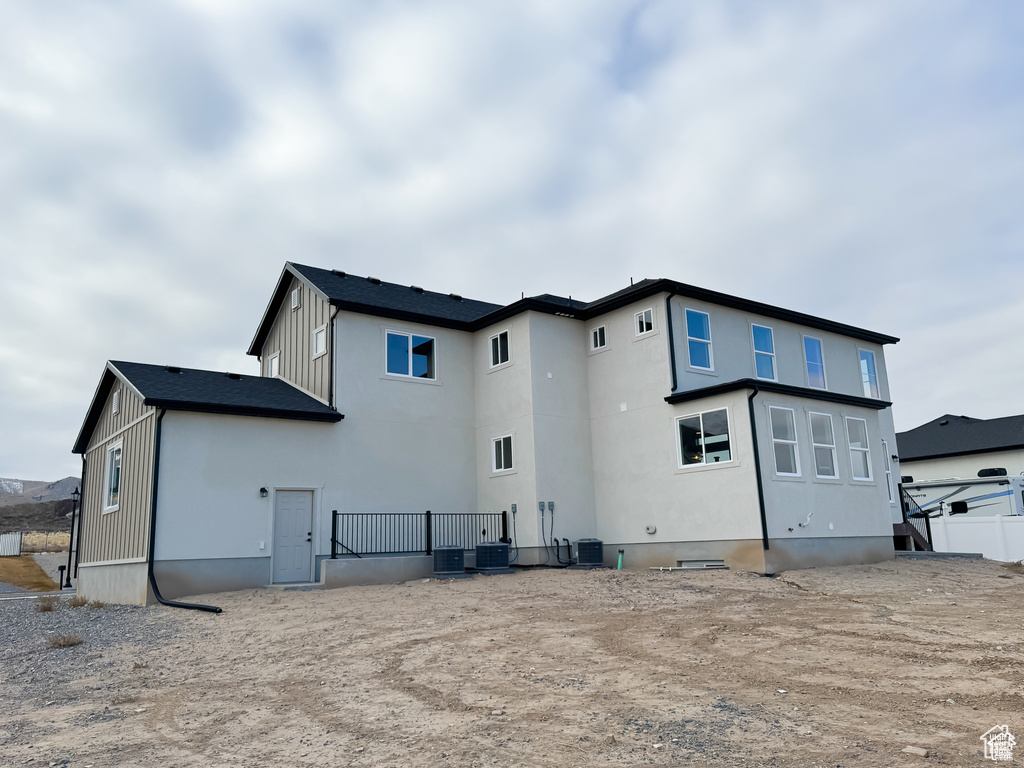 Back of property with cooling unit
