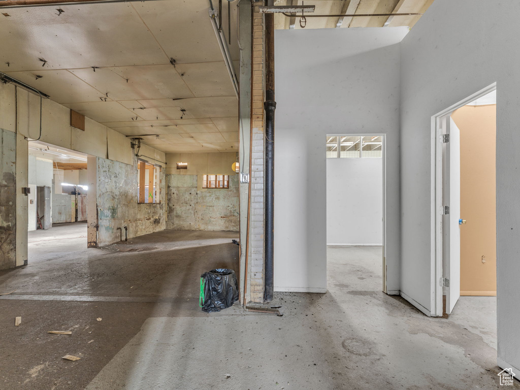 Hall with concrete flooring