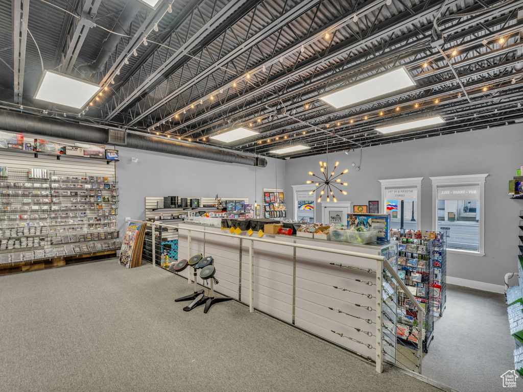 Miscellaneous room with carpet floors and baseboards