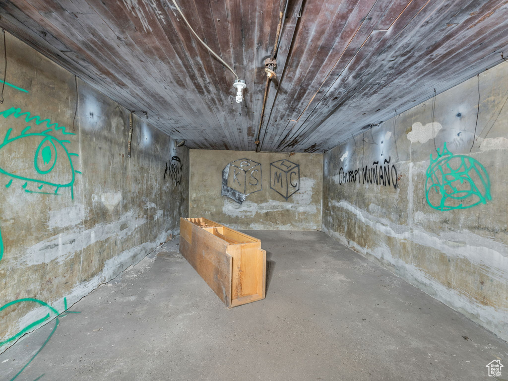 Unfinished basement with wooden ceiling