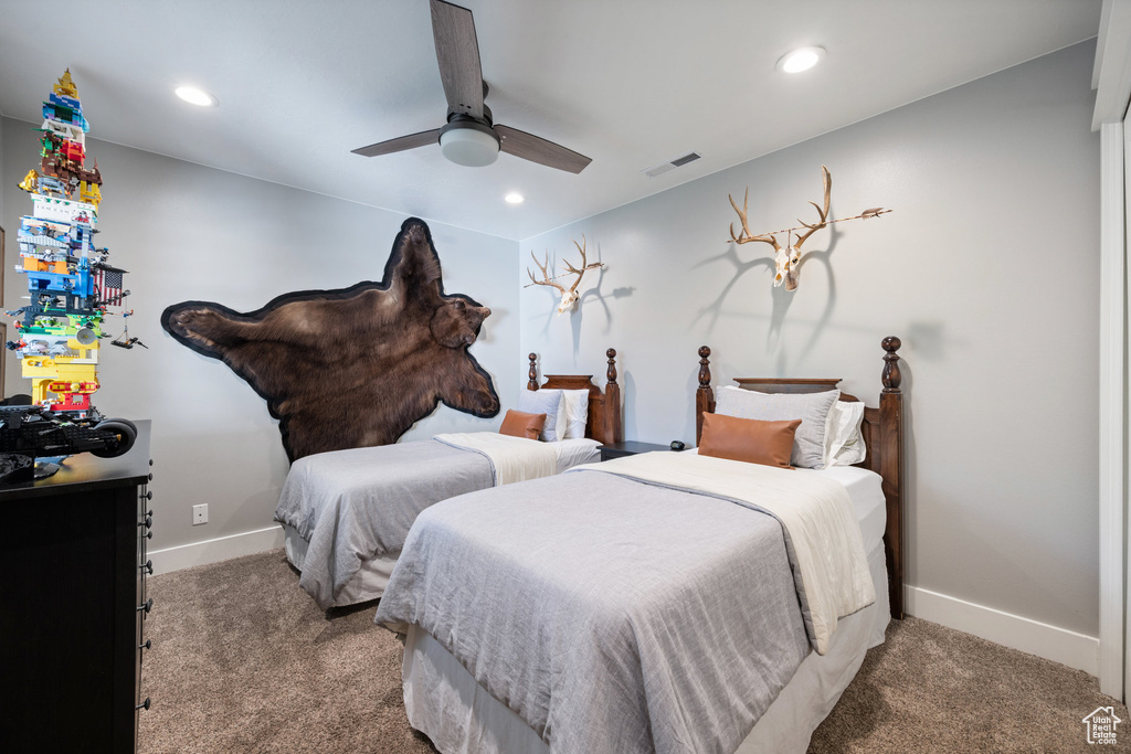 Bedroom with carpet flooring, baseboards, recessed lighting, and a ceiling fan