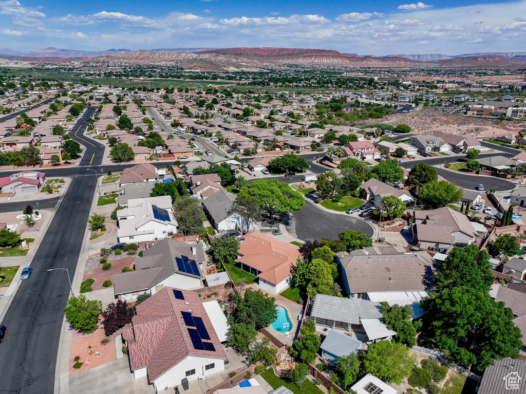 Aerial view of residential area with a mountain backdrop