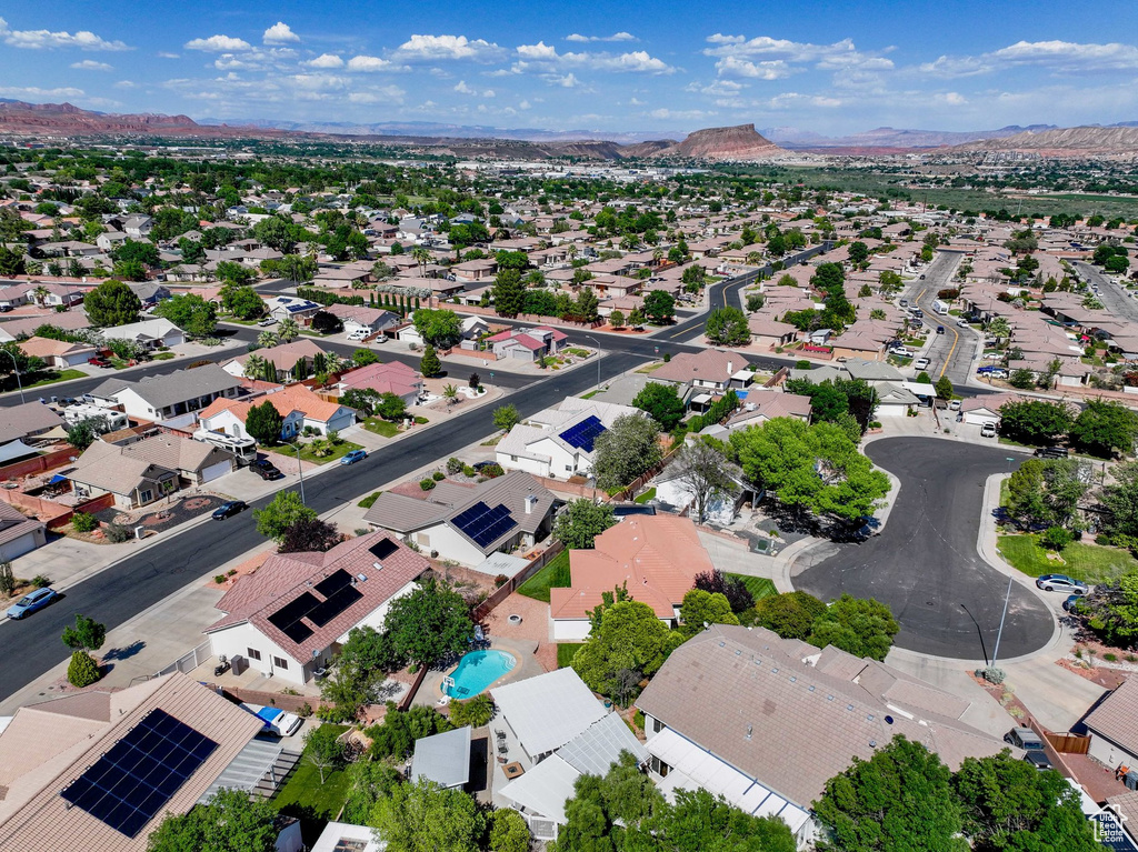 Aerial view of residential area with a mountain backdrop