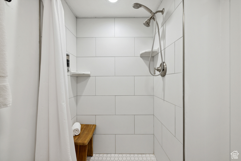 Bathroom with tiled shower