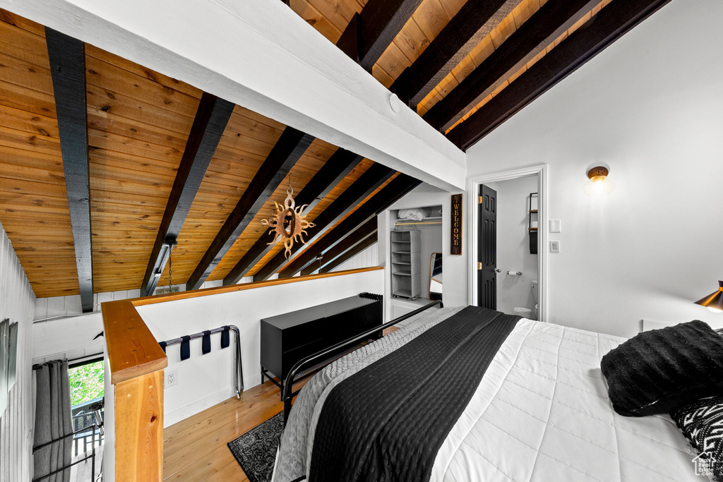 Bedroom featuring wooden ceiling and wood finished floors