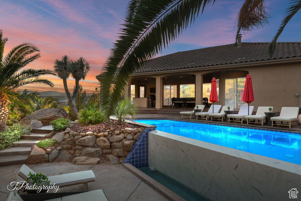 Swimming pool featuring a patio area