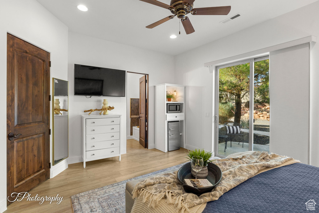 Bedroom with access to exterior, light wood-type flooring, recessed lighting, connected bathroom, and baseboards
