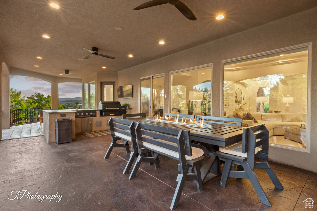 View of patio / terrace featuring ceiling fan and outdoor dining area