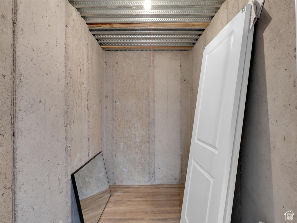 Below grade area featuring wood finished floors