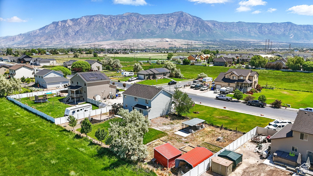 Aerial view of residential area featuring mountains
