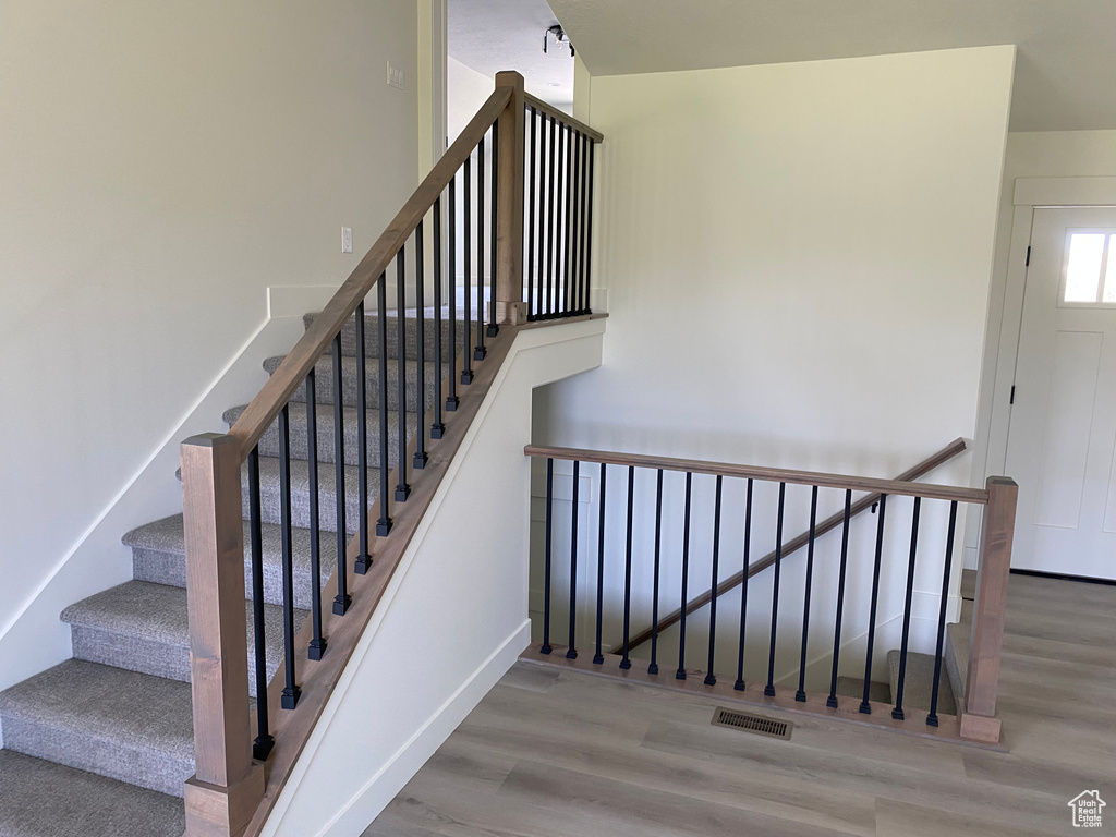 Stairs with wood finished floors