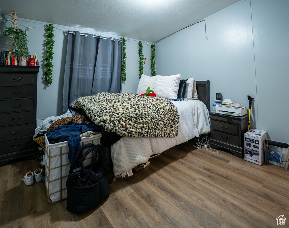 Bedroom featuring wood finished floors