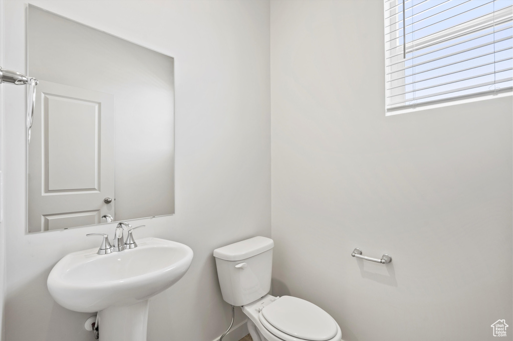 Bathroom with toilet and a sink