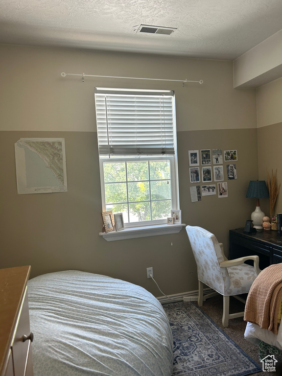 Bedroom with carpet