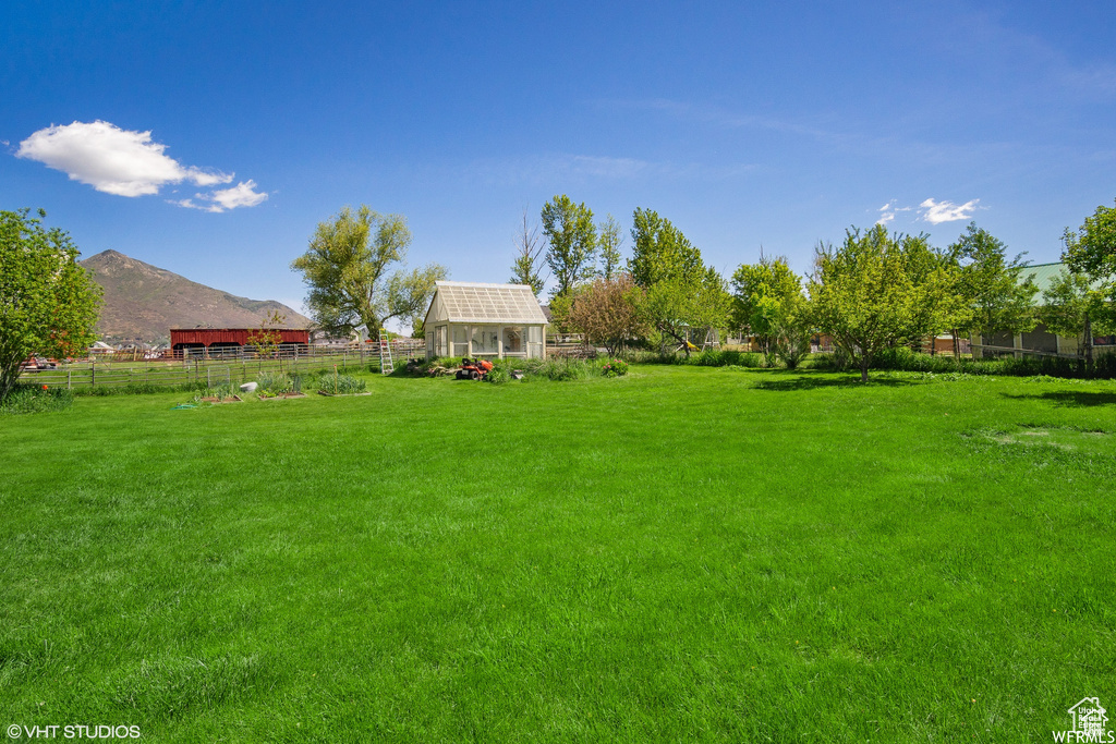 View of yard with a mountain view