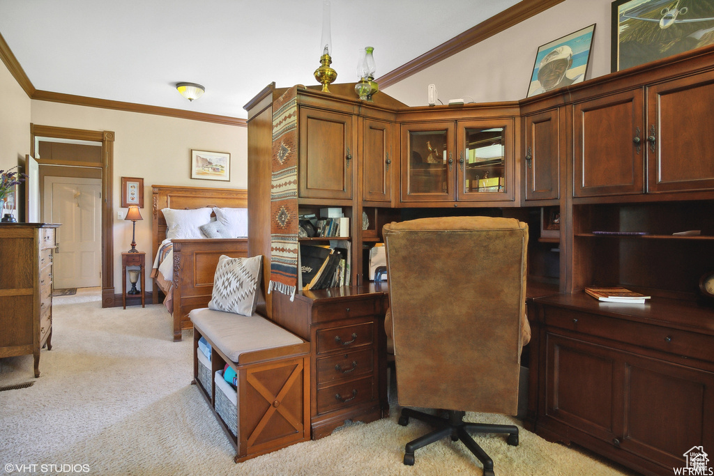 Office area with light colored carpet and crown molding