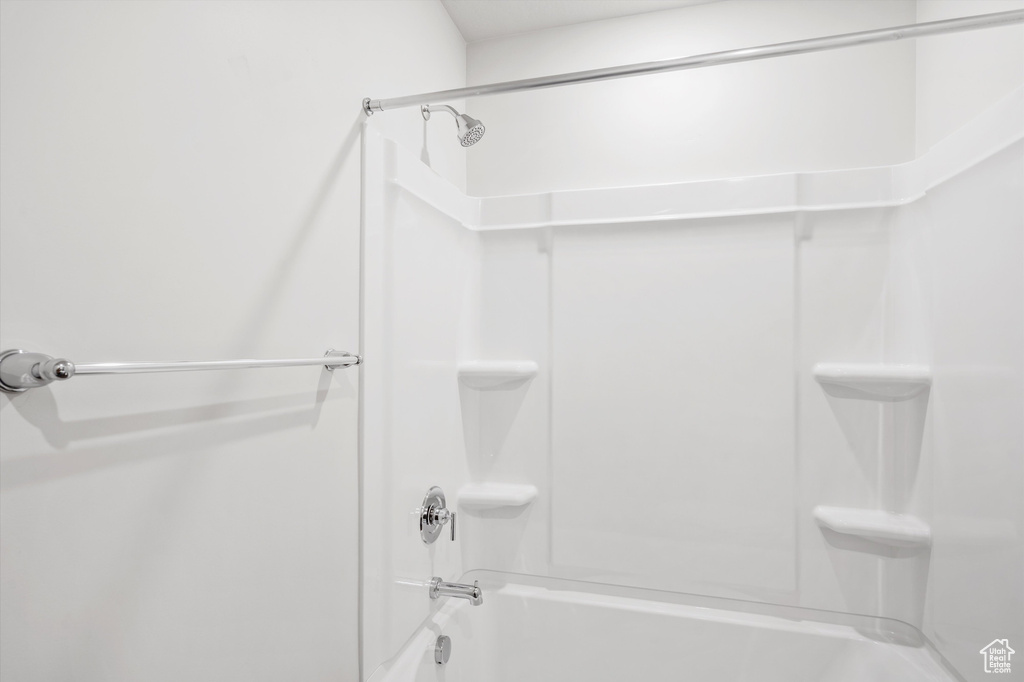 Full bath featuring bathtub / shower combination