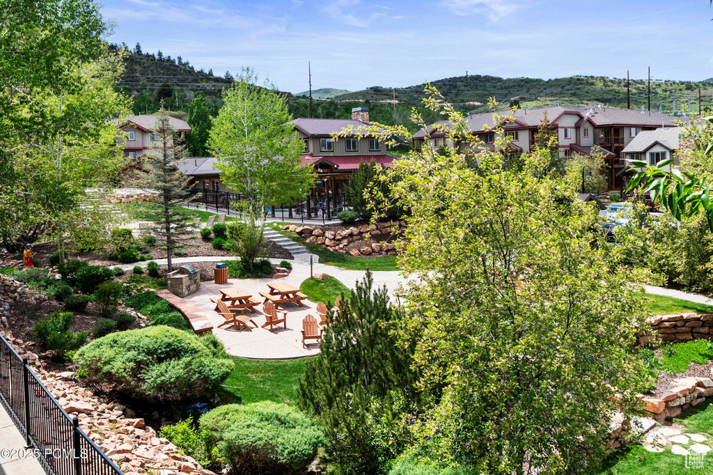 View of yard with a mountain view and a residential view