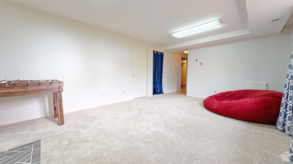 Sitting room featuring carpet