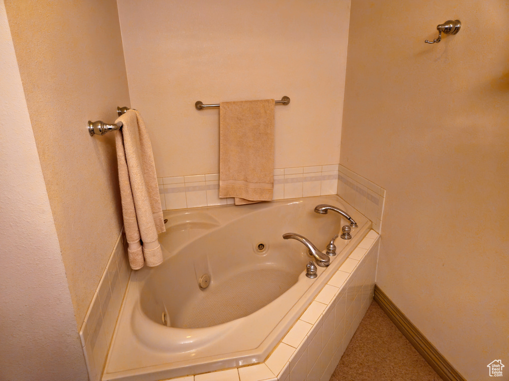 Full bath with a whirlpool tub
